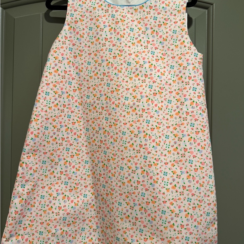 The Beaufort Bonnet Company Pink Floral dress very structured.